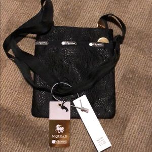 NWT Lesportsac crossbody.Black with paisley print